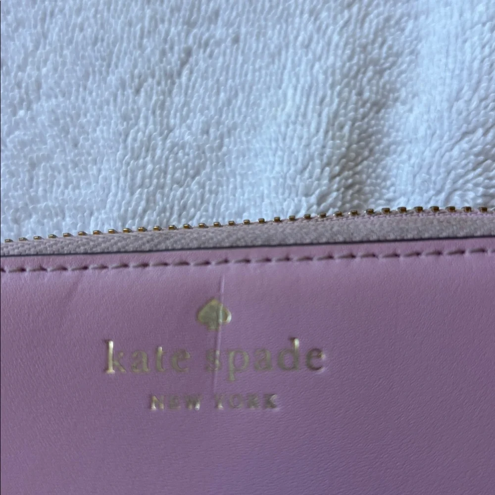 kate spade Leather Zip-Around Wallet in Mauve Pink with Gold Logo